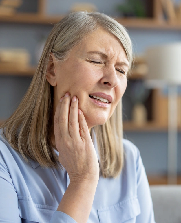Patient experiencing severe tooth pain and seeking emergency dental care at Cariboo Choice Dental in Williams Lake, BC