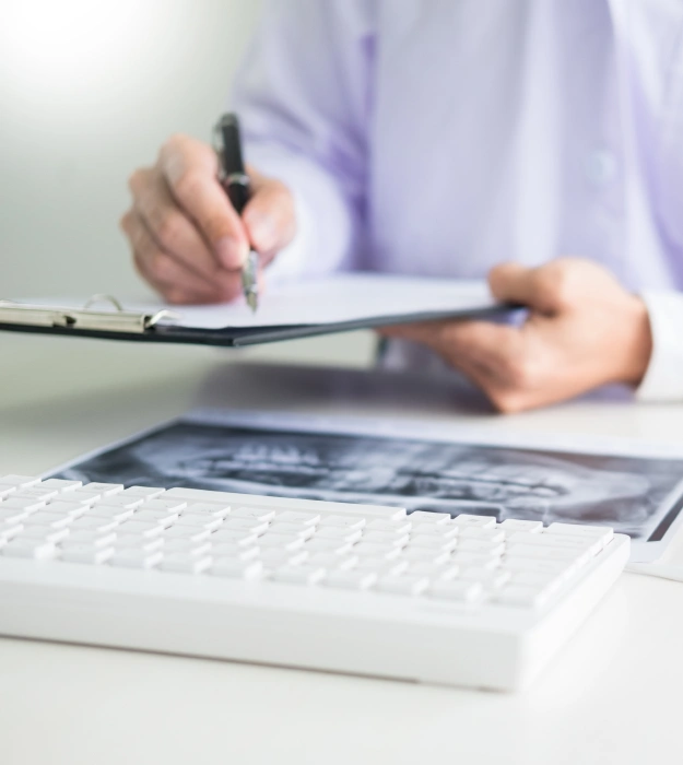 Patient reviewing dental insurance and financing options