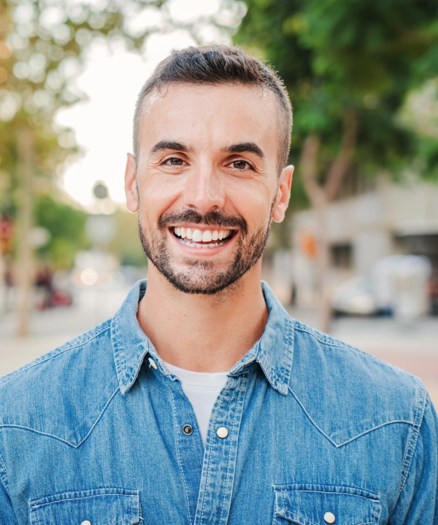 Patient showing a brighter, whiter smile after professional teeth whitening at Cariboo Choice Dental.