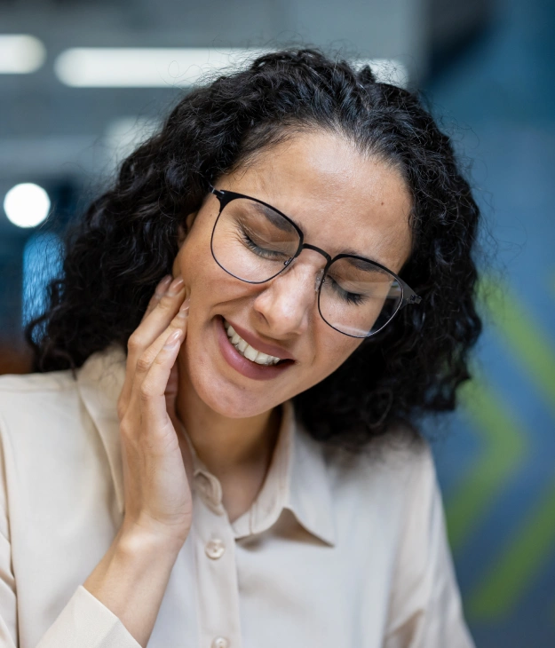 Patient receiving consultation for TMJ treatment and jaw pain relief